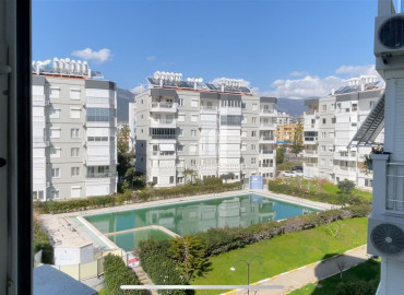 Furnished apartment 3 + 1 in a cozy residence on the first line in Alanya Tosmur ID-8211 фото-2