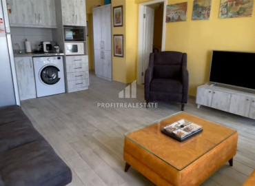 Furnished apartment 3 + 1 in a cozy residence on the first line in Alanya Tosmur ID-8211 фото-4