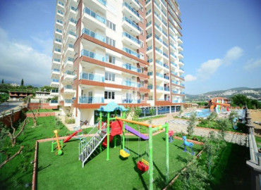 Furnished one-bedroom apartment with mountain views near the sea in Mahmutlar ID-8212 фото-1