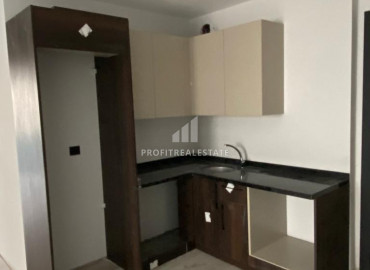 Новые квартиры с одной спальней в 250м от моря в центре Мерсина, район Енишехир ID-8225 фото-4