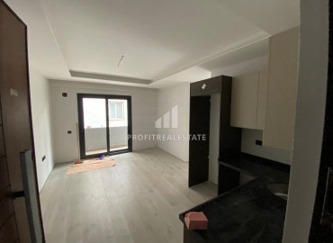 Новые квартиры с одной спальней в 250м от моря в центре Мерсина, район Енишехир ID-8225 фото-8