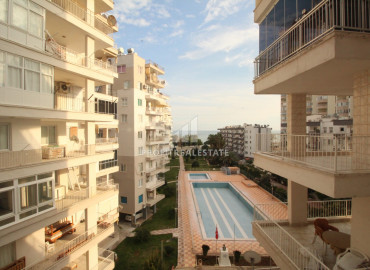 Spacious apartment 2 + 1 with sea views in Tej, Mersin, 50 meters from the sea ID-8227 фото-1