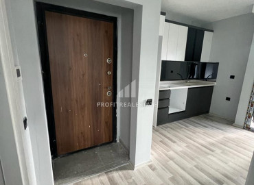 Новая двухкомнатная квартира с отличным расположением в микрорайоне Соли, Мерсин ID-8243 фото-2