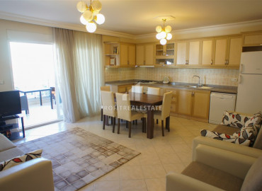 Large furnished two bedroom apartment on the main street of Mahmutlar with sea view ID-8254 фото-1