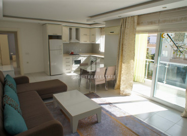 Furnished one-bedroom apartment, on the main street 400m from the sea in Mahmutlar ID-8256 фото-1