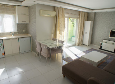 Furnished one-bedroom apartment, on the main street 400m from the sea in Mahmutlar ID-8256 фото-3