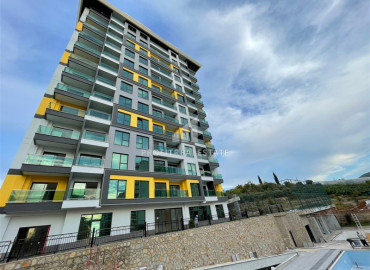 New apartment with mountain views, in a residence built in 2021, 650 meters from Mahmutlar beach, Alanya ID-8275 фото-1