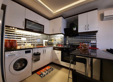 Furnished apartment 1 + 1, 60m² in a residence with facilities in Mahmutlar, 450m from the sea ID-8282 фото-3