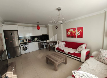 Spacious one bedroom apartment, equipped with furniture and appliances, in a comfortable residential residence Mahmutlar, Alanya, 70 m2 ID-8297 фото-1