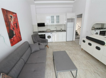 One bedroom apartment in a residence with a swimming pool, 250m from the sea in Mahmutlar ID-8301 фото-2