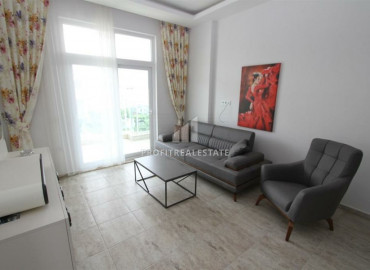 One bedroom apartment in a residence with a swimming pool, 250m from the sea in Mahmutlar ID-8301 фото-3