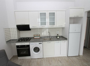 One bedroom apartment in a residence with a swimming pool, 250m from the sea in Mahmutlar ID-8301 фото-4