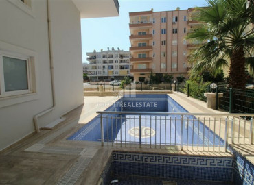 One bedroom apartment in a residence with a swimming pool, 250m from the sea in Mahmutlar ID-8301 фото-9