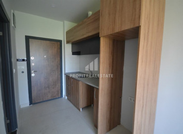 New apartment 1 + 1 with a fine finish in a residence with a swimming pool in Mahmutlar, 500m from the sea ID-8305 фото-2