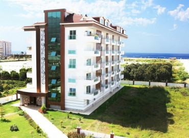 Two bedroom apartment, equipped with furniture and appliances, 100 meters from the sea, in Kestel, Alanya, 115 m2 ID-8310 фото-1