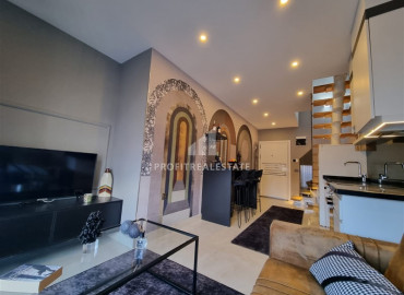 Duplex with one bedroom in a premium class residence on the beach in Mahmutlar. ID-8312 фото-1