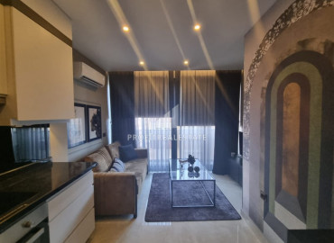 Duplex with one bedroom in a premium class residence on the beach in Mahmutlar. ID-8312 фото-6
