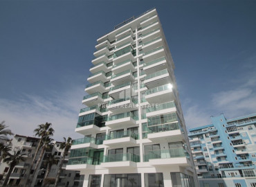 New one-bedroom apartment on the first coastline in the elite residence Mahmutlar ID-8335 фото-1