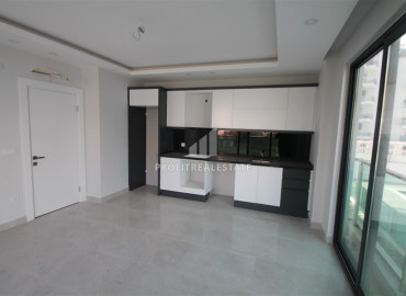 New one-bedroom apartment on the first coastline in the elite residence Mahmutlar ID-8335 фото-3