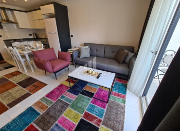 Furnished one-bedroom apartment 60m² in Mahmutlar in a residence with facilities ID-8341 фото-3