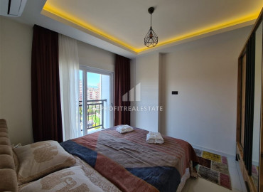 Furnished one-bedroom apartment 60m² in Mahmutlar in a residence with facilities ID-8341 фото-4