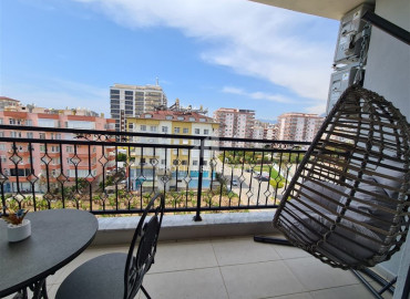 Furnished one-bedroom apartment 60m² in Mahmutlar in a residence with facilities ID-8341 фото-6