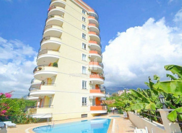 Apartment with two bedrooms, furniture and appliances overlooking the mountains in Mahmutlar ID-8343 фото-1