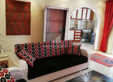 Apartment with two bedrooms, furniture and appliances overlooking the mountains in Mahmutlar ID-8343 фото-3