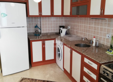 Apartment with two bedrooms, furniture and appliances overlooking the mountains in Mahmutlar ID-8343 фото-6