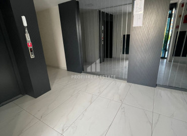 New design apartment 2+1 in a residence with minimal facilities in Yenishehir, Mersin ID-8357 фото-7