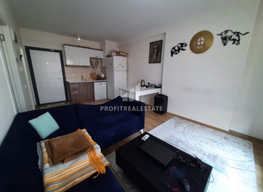 Budget furnished apartment 1 + 1 in the Ciftlikkoy microdistrict of the Yenishehir district, Mersin ID-8362 фото-5