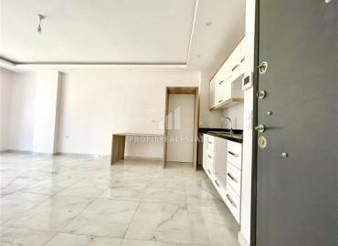 Apartment 1 + 1 in a new residence 400m from the sea in Mahmutlar at a great price ID-8383 фото-2