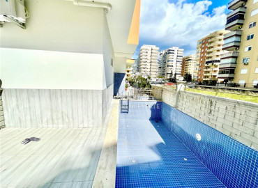 Apartment 1 + 1 in a new residence 400m from the sea in Mahmutlar at a great price ID-8383 фото-19