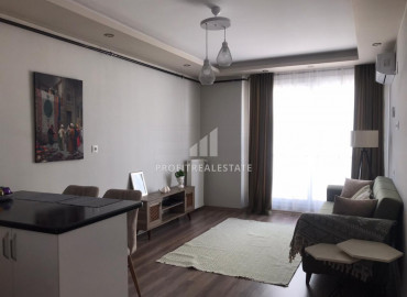 New furnished one-bedroom apartment with gas 150 meters from the sea in the Soli neighborhood, Mersin ID-8394 фото-2