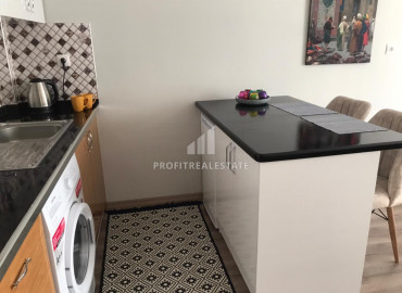 New furnished one-bedroom apartment with gas 150 meters from the sea in the Soli neighborhood, Mersin ID-8394 фото-5