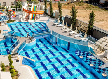 Furnished duplex 2 + 1 with sea and mountain views in the elite residence Mahmutlar ID-8395 фото-16