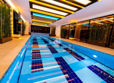 Furnished duplex 2 + 1 with sea and mountain views in the elite residence Mahmutlar ID-8395 фото-17