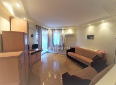 Two bedroom apartment with a separate kitchen, at a bargain price, just 150 meters from the sea, Mahmutlar, Alanya ID-8400 фото-2