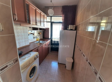 Two bedroom apartment with a separate kitchen, at a bargain price, just 150 meters from the sea, Mahmutlar, Alanya ID-8400 фото-4