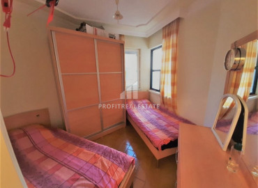 Two bedroom apartment with a separate kitchen, at a bargain price, just 150 meters from the sea, Mahmutlar, Alanya ID-8400 фото-7