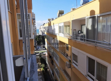 Two bedroom apartment with a separate kitchen, at a bargain price, just 150 meters from the sea, Mahmutlar, Alanya ID-8400 фото-8