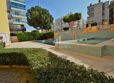 Two bedroom apartment with a separate kitchen, at a bargain price, just 150 meters from the sea, Mahmutlar, Alanya ID-8400 фото-13