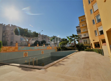 Two bedroom apartment with a separate kitchen, at a bargain price, just 150 meters from the sea, Mahmutlar, Alanya ID-8400 фото-14