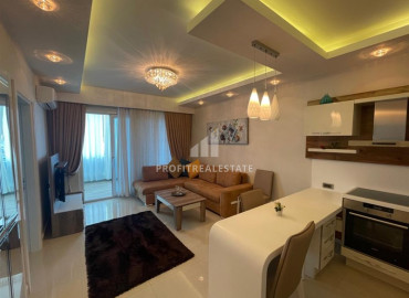 Furnished one bedroom apartment a stone's throw from the sea, Mahmutlar, Alanya, 87 m2 ID-8410 фото-1
