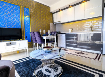 Stylish apartment by the sea, with one bedroom, 300 meters from the center of Mahmutlar, Alanya, 55 m2 ID-8414 фото-2