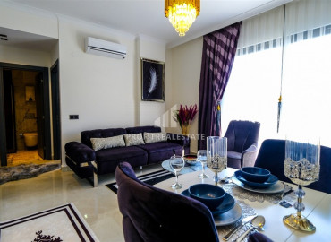 Stylish apartment by the sea, with one bedroom, 300 meters from the center of Mahmutlar, Alanya, 55 m2 ID-8414 фото-3