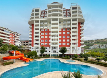 Two-bedroom apartment with a view of the Alanya fortress in a premium class residence in Cikcilli ID-8421 фото-1