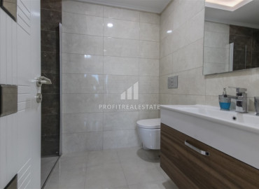 Stylish furnished apartment 2 + 1 with sea views in the elite residence Mahmutlar ID-8456 фото-17}}