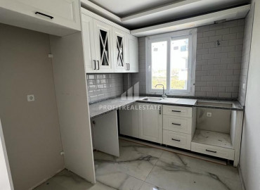 Квартира с двумя спальнями в новой резиденции в 650 метрах от моря в районе Мерсина – Тедже ID-8466 фото-1