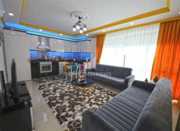 Furnished apartment 2 + 1 in a residence with a swimming pool in the western part of Mahmutlar ID-8480 фото-2